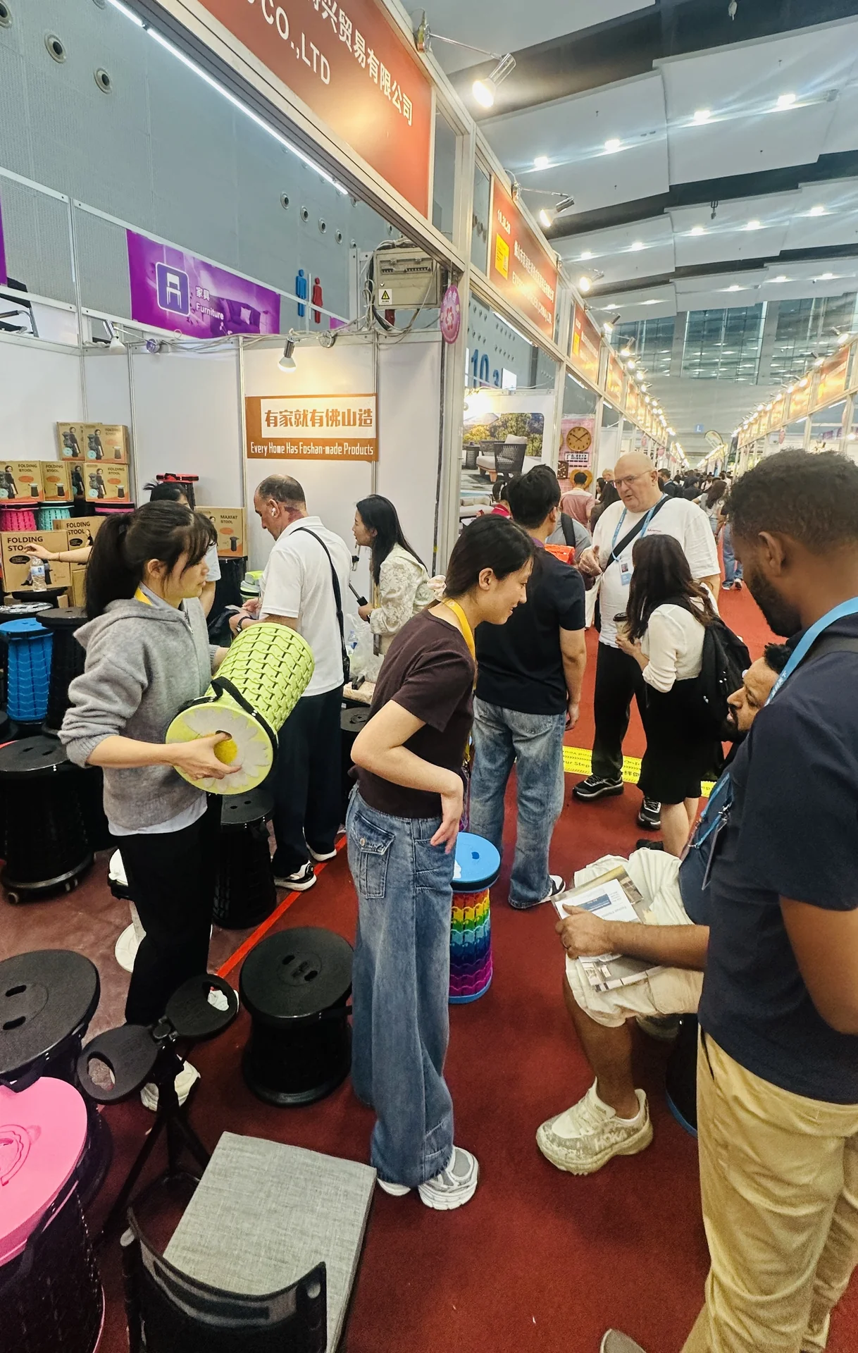 Locyop collapsible stools displayed at 139th Canton Fair Spring 2026 with buyers examining products