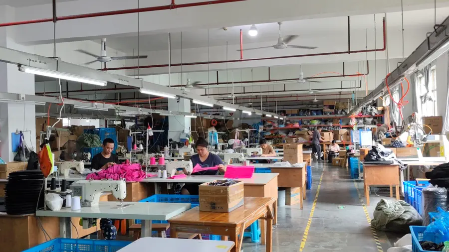 Cushion and strap sewing production floor at Locyop collapsible stool factory